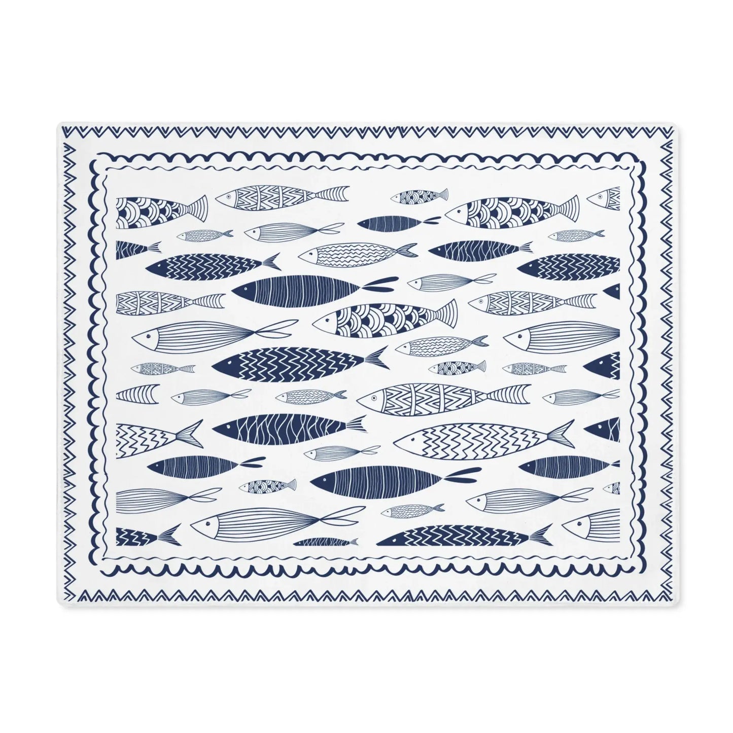 Blue Fish Cotton Placemats featuring hand-drawn fish illustrations in navy blue on a light background.