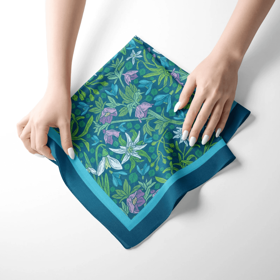 woman hands holding blue silk scarf