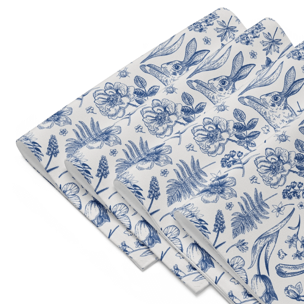 Blue Toile Bunny Placemats featuring detailed blue and white floral and rabbit illustrations, perfect for Easter decor.