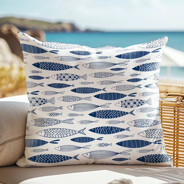 rattan outdoor sofa with outdoor cushion from Blue Water Songs on it