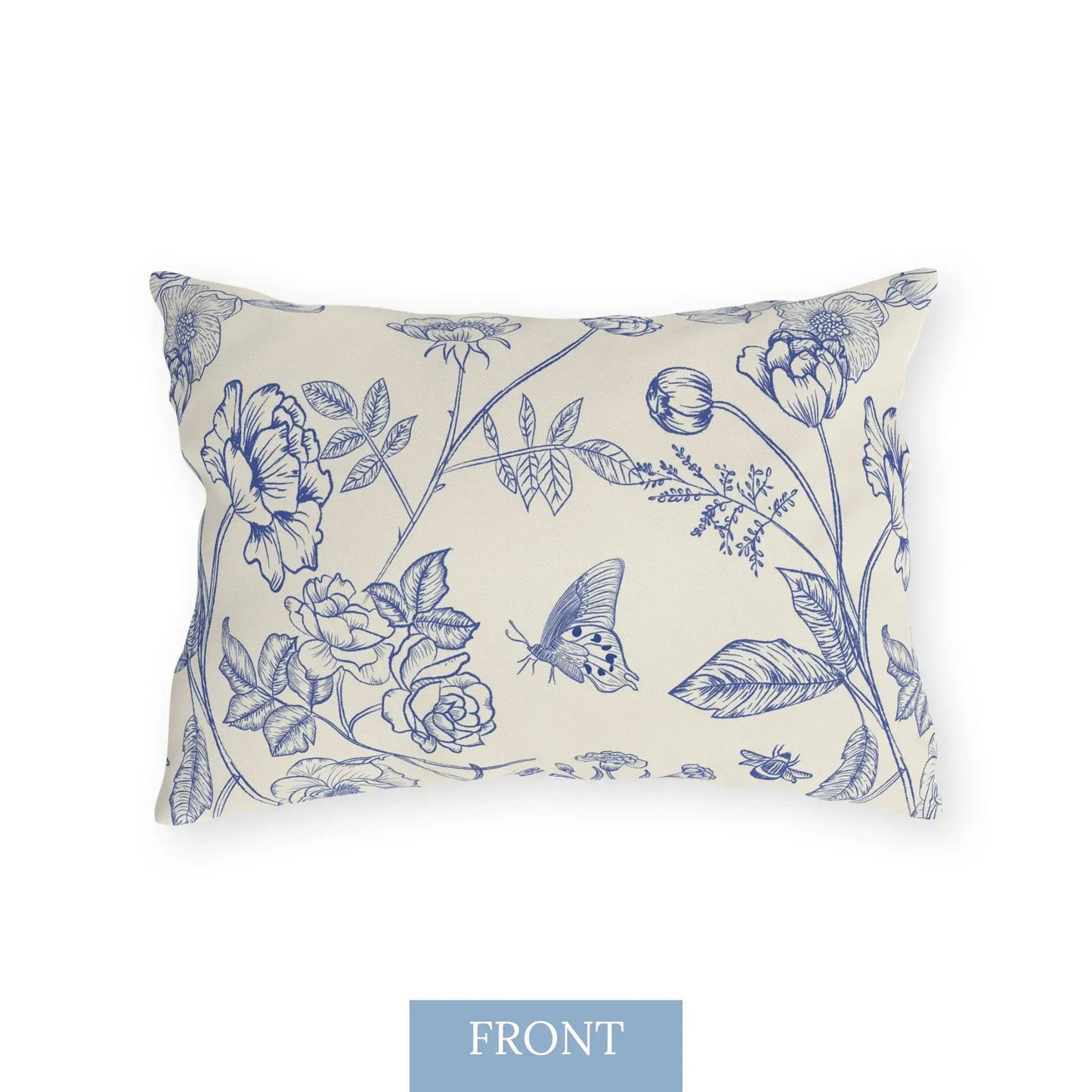 Front view of rectangular outdoor pillow with blue vintage floral and butterfly print on cream background — water-resistant botanical decor pillow.