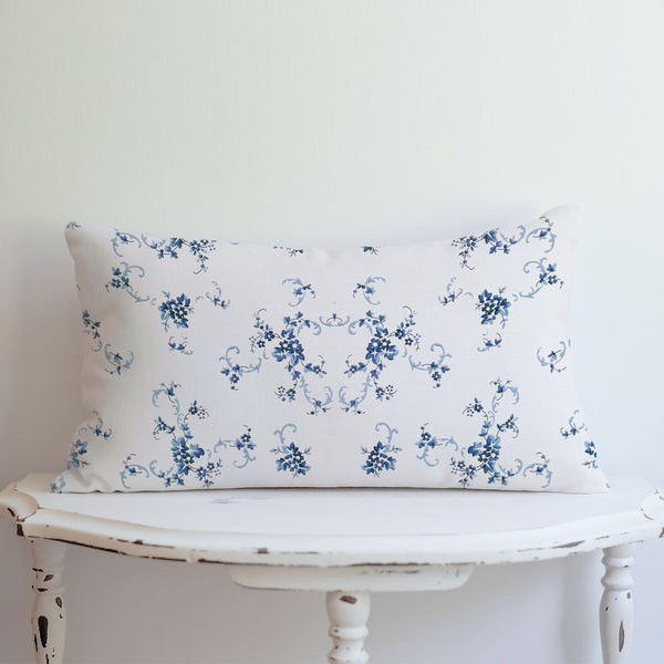 Vintage blue floral lumbar PILLOW from Blue Water Songs on white vintage table