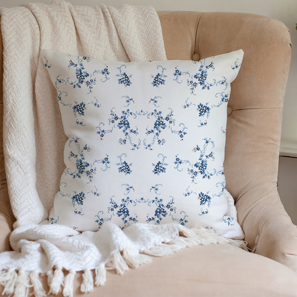 Vintage blue floral throw PILLOW from Blue Water Songs on pink sofa