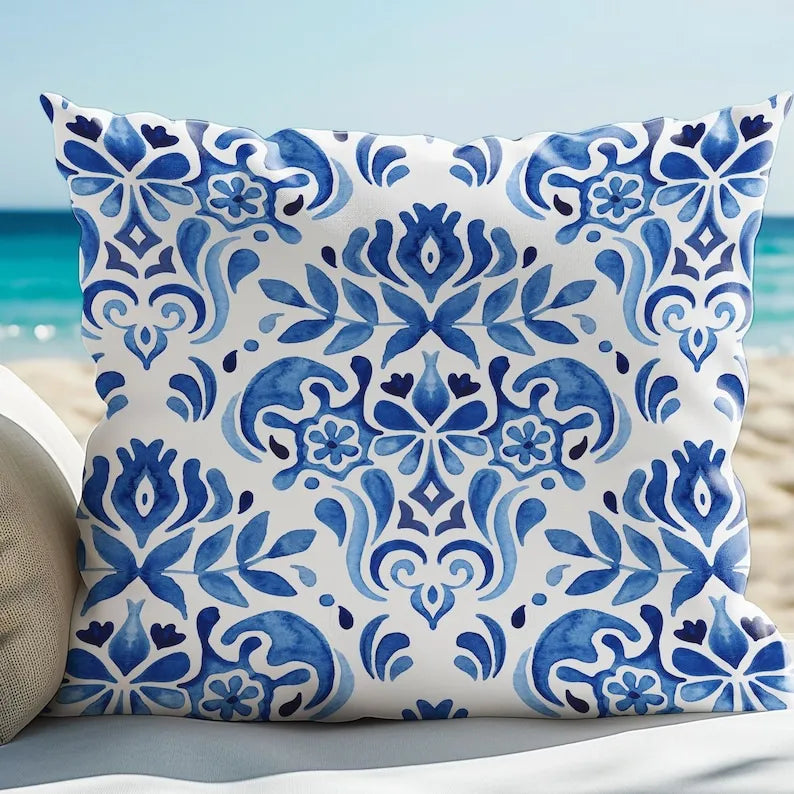 Blue Watercolor Hand-Painted Tile Pattern| OUT DOOR PILLOW from Blue Water Songs sitting on the beach