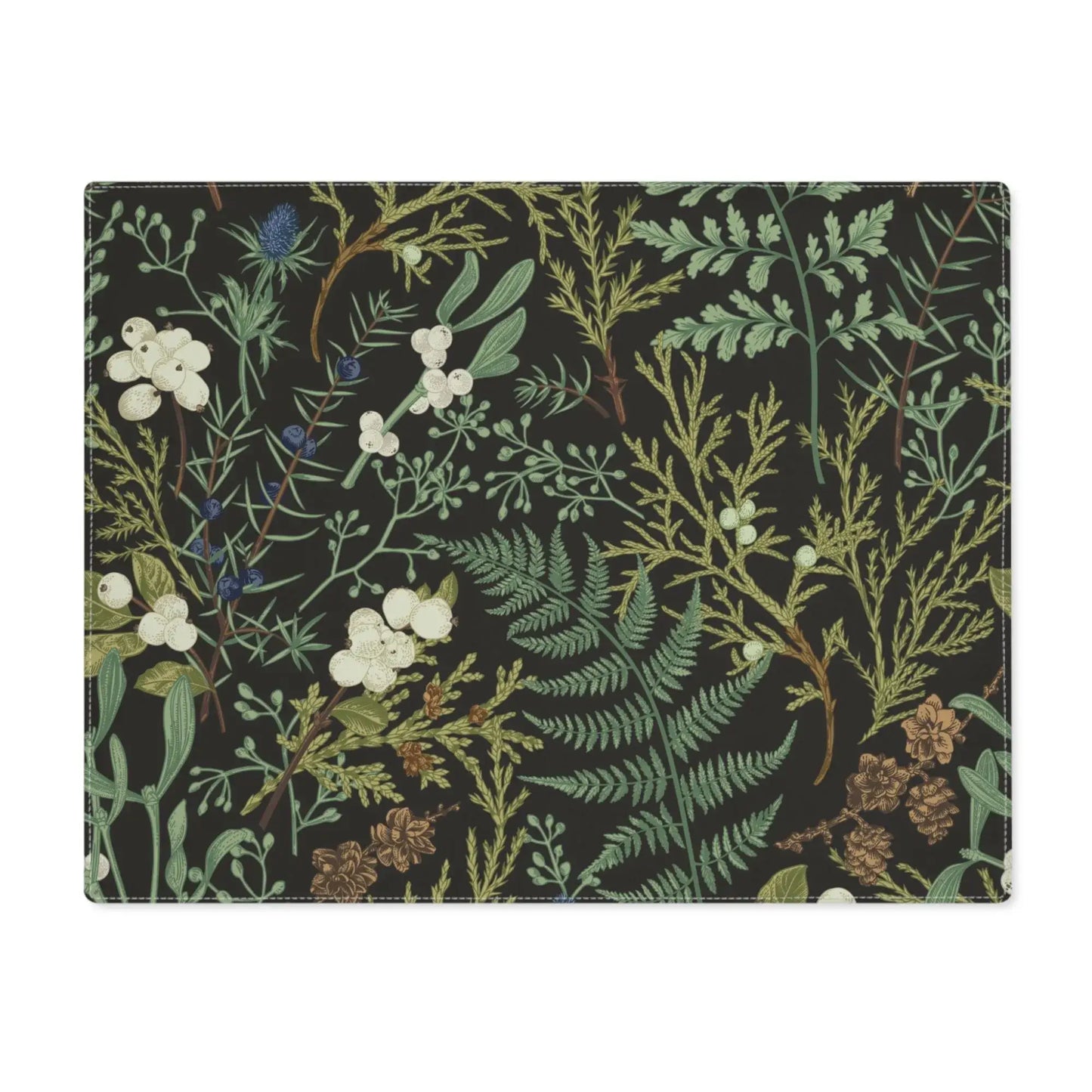 Botanical Christmas placemats featuring winter greenery and florals on a dark background.