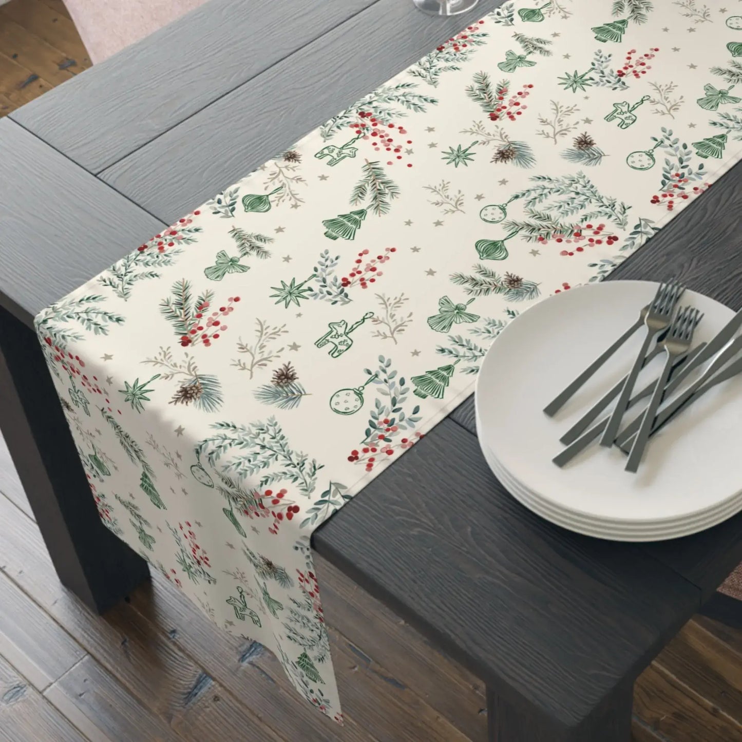 Botanical Christmas Table Runner on a dining table, featuring pine branches and red berries, perfect for festive decor.