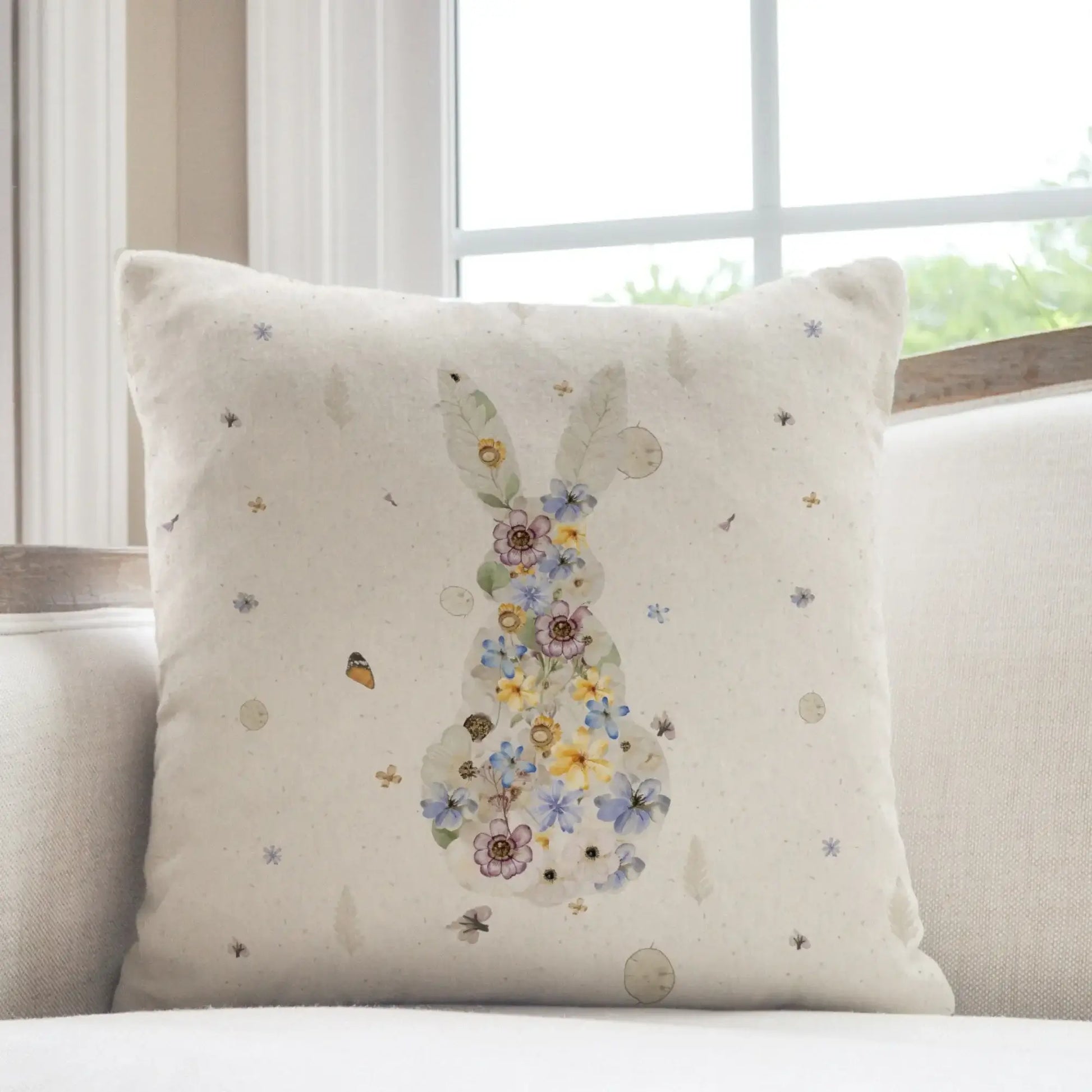Bunny Pressed Flowers Spring Pillow Cover featuring a floral bunny design on a light background.