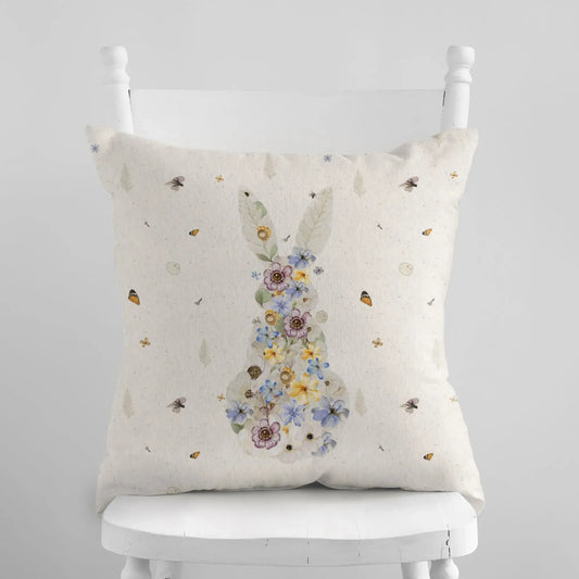 Bunny Pressed Flowers Spring Pillow Cover featuring floral design on a cozy pillow against a neutral background.