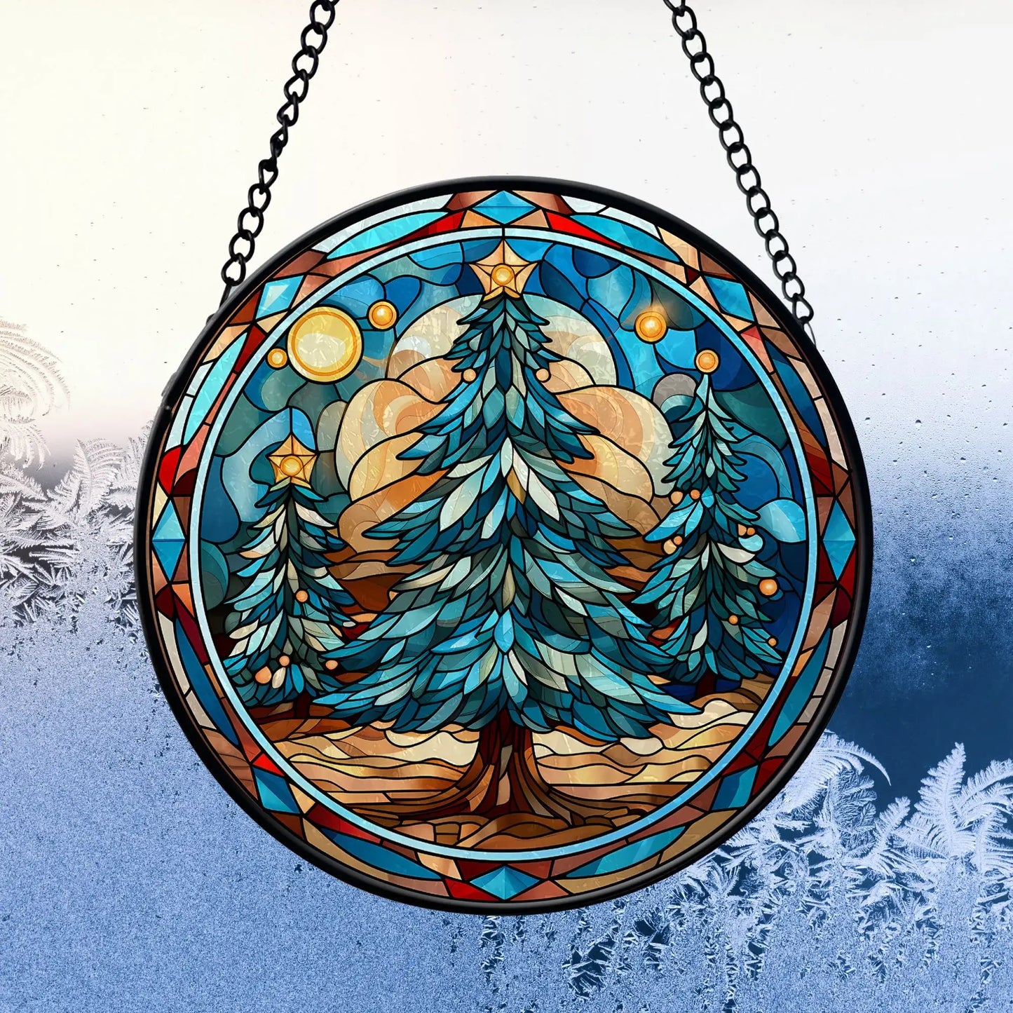 Blue Christmas tree stained glass ornament featuring pine trees and decorative elements.