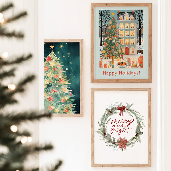 eclectic christmas posters hanging on white wall