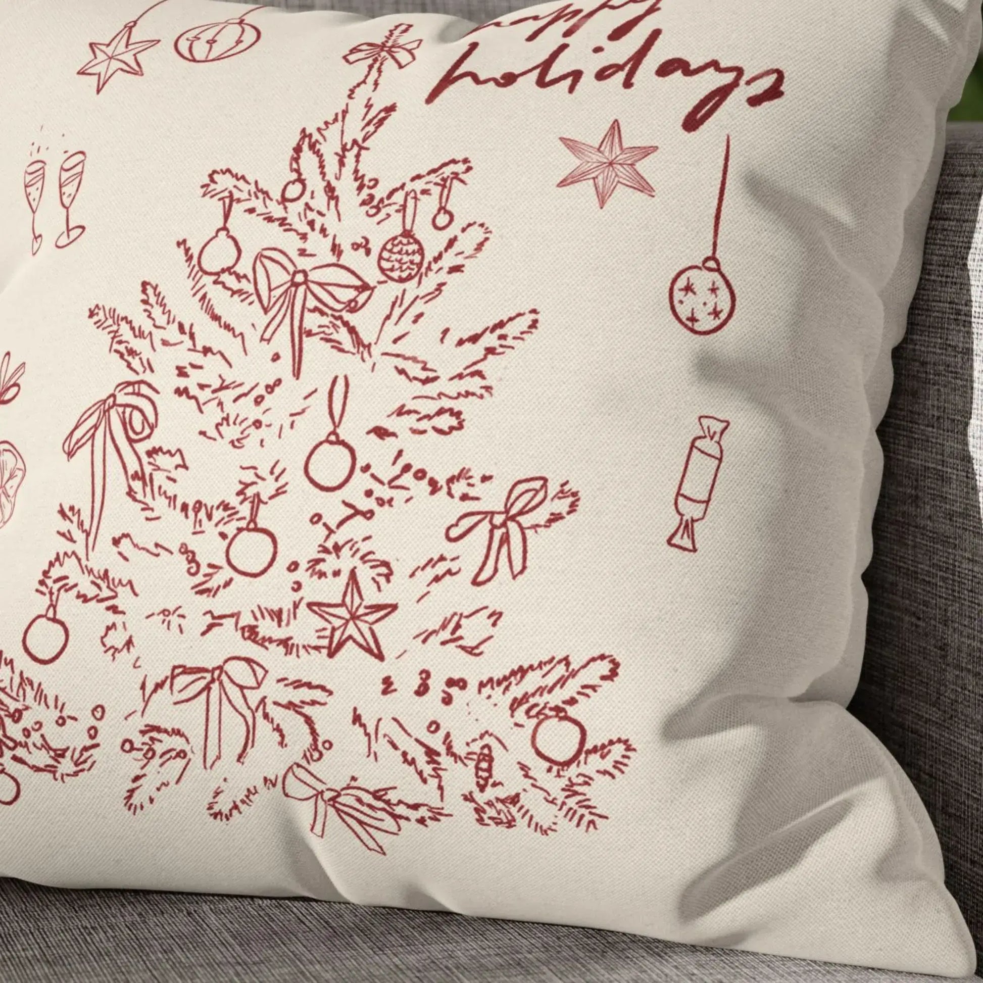 Close-up of red Christmas tree pillow cover with hand-drawn festive detail and retro holiday charm