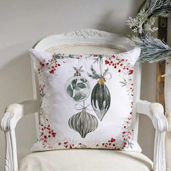 watercolor ornaments christmas pillow on vintage chair