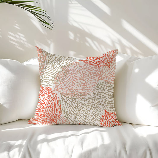 3 decorative pillows placing on white coach