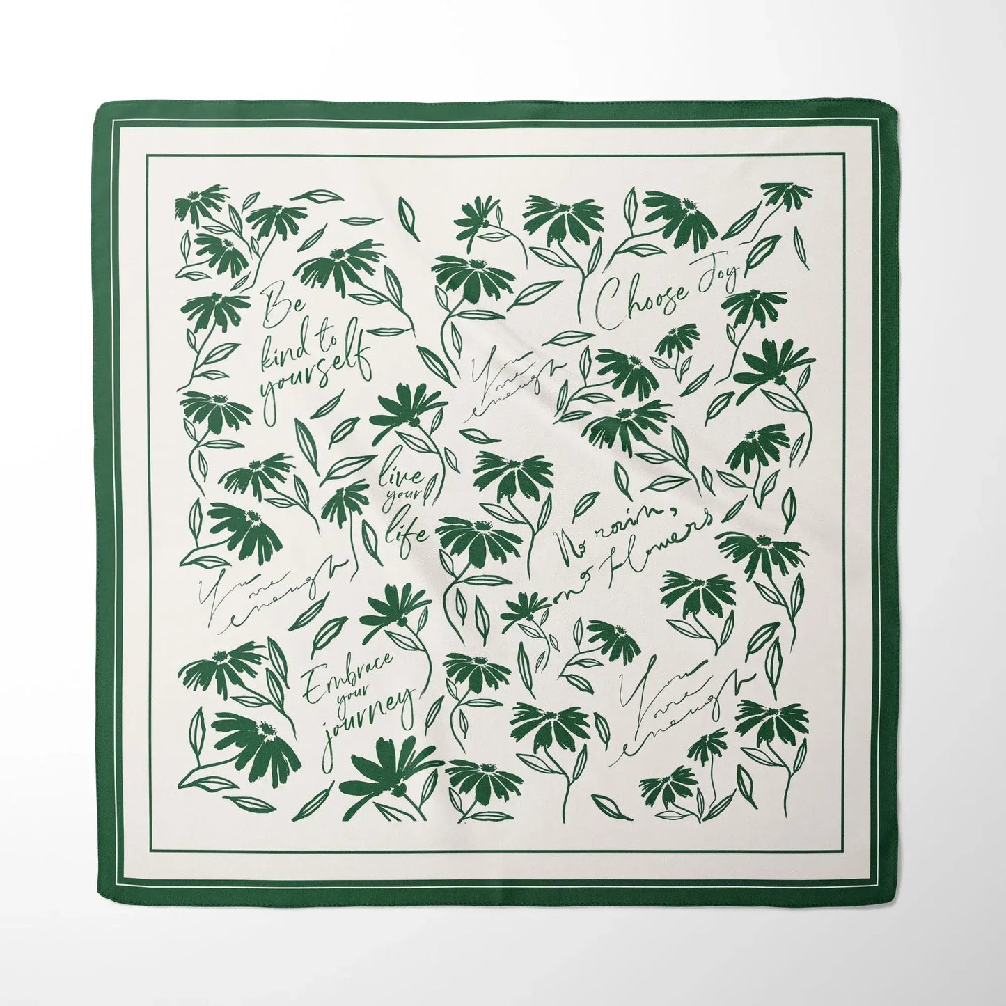 Green daisy wildflowers silk scarf laid flat showing full minimal floral pattern and soft green border