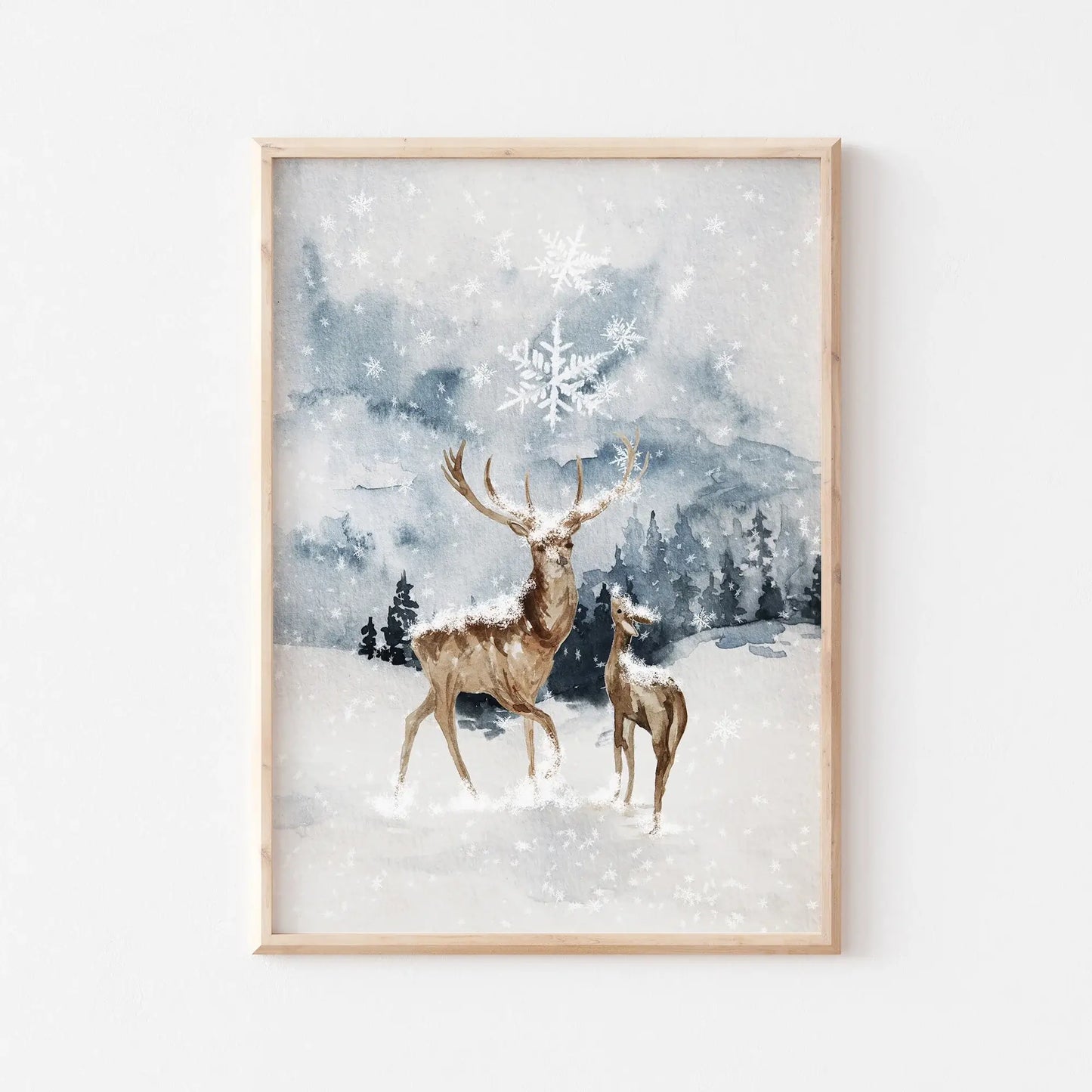 Winter Wonderland Prints Set of 5 artwork featuring deer in a snowy landscape, capturing the essence of winter.