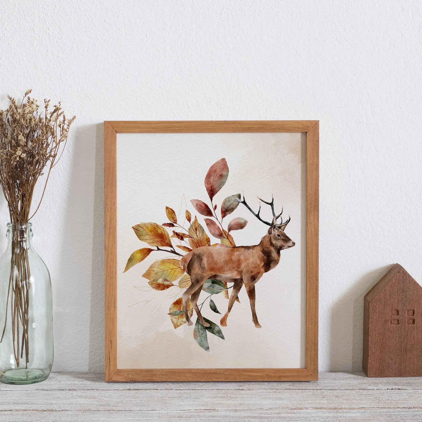 Watercolor Autumn Deer art frame from Blue Water Songs placing next to wood toy