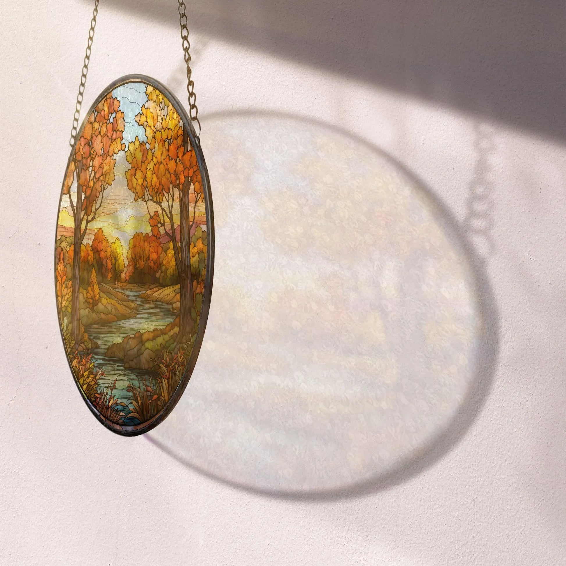 beautiful reflection of autumn suncatcher on the wall