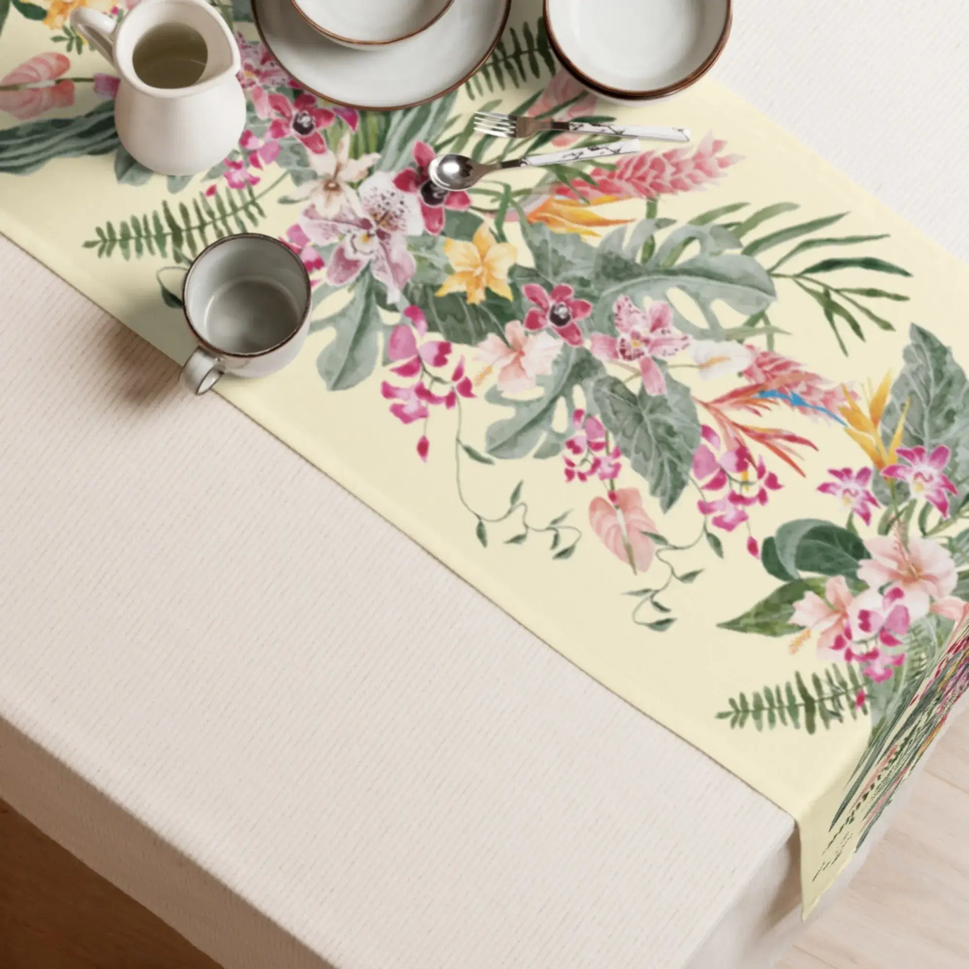Floral Tropical TABLE RUNNER featuring watercolor orchids and tropical greenery on a light yellow backdrop.