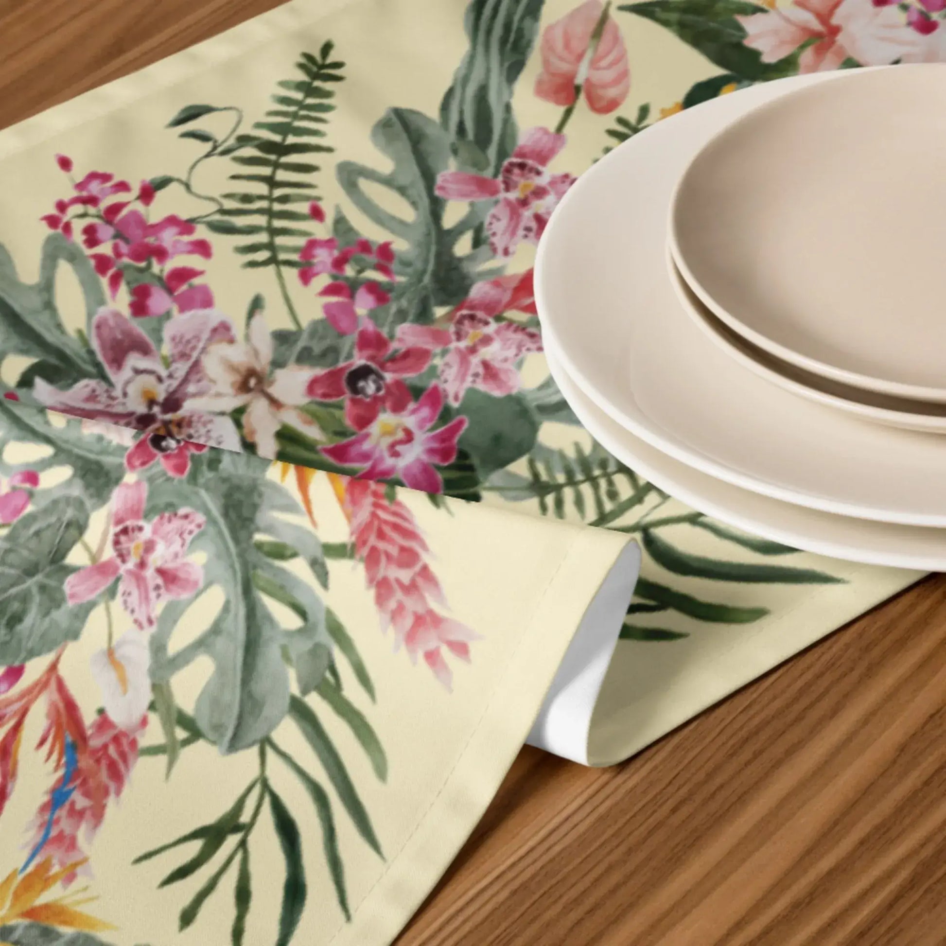 Floral Tropical TABLE RUNNER in light yellow with orchid and greenery design, enhancing the dining table decor.