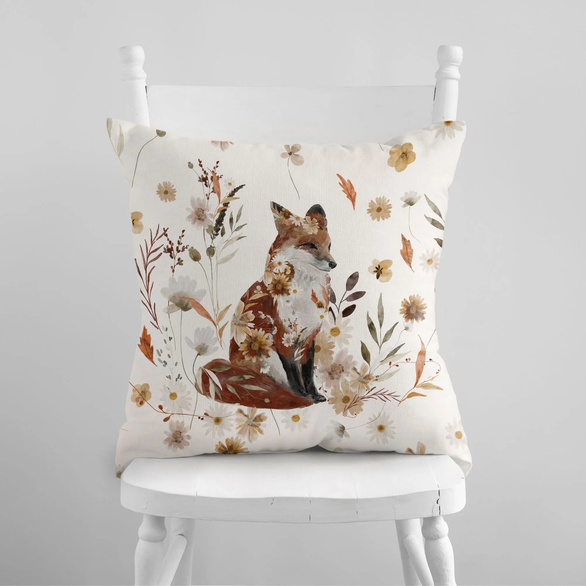 white chair with beautiful fox pillow from Blue Water Songs