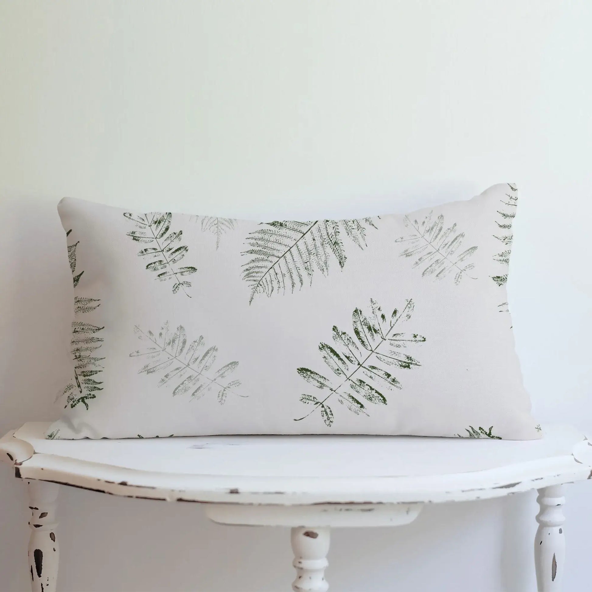 white table with Green Leaves lumbar PILLOW from Blue Water Songs 