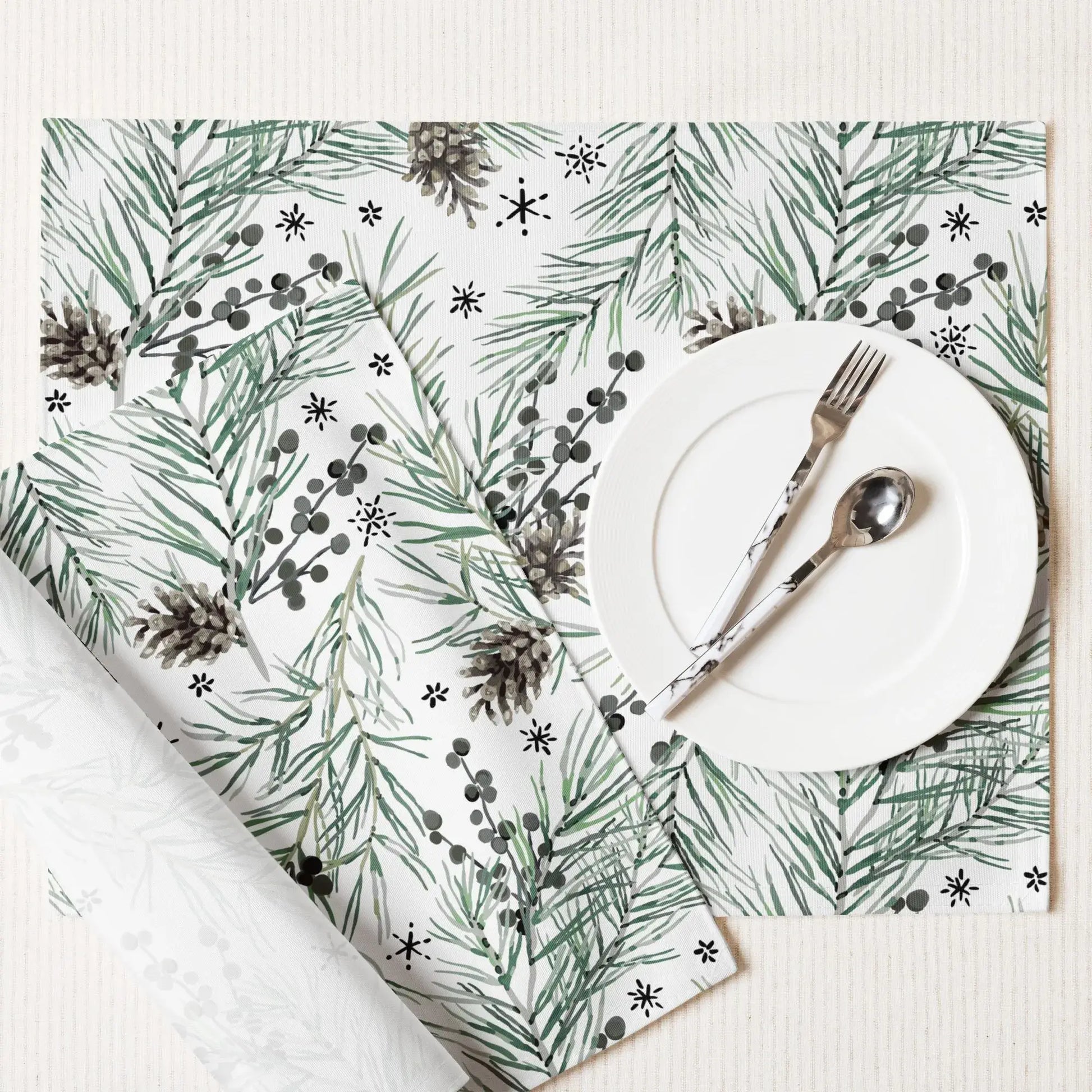 Green Pine and Berry Winter Botanical Placemats featuring pine branches and berries, perfect for festive table settings.