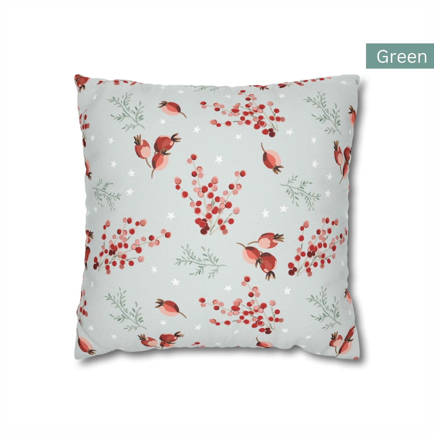 Green red berry winter botanical pillow with rosehips and star accents – nature-inspired Christmas cushion cover