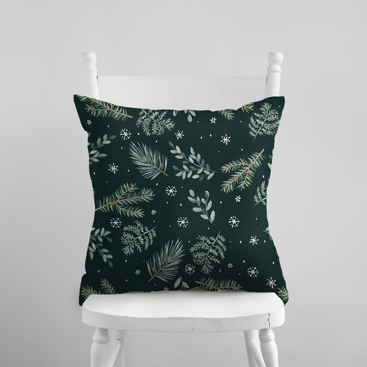 white chair with green pine winter pillow from Blue Water Songs