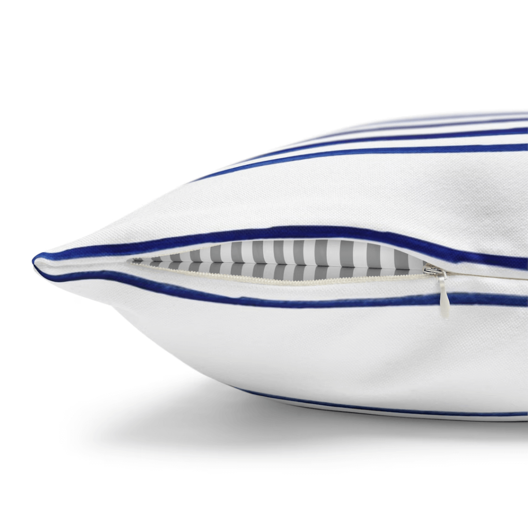 Hamptons Striped Pillow featuring blue and white stripes with zipper detail for coastal home decor.