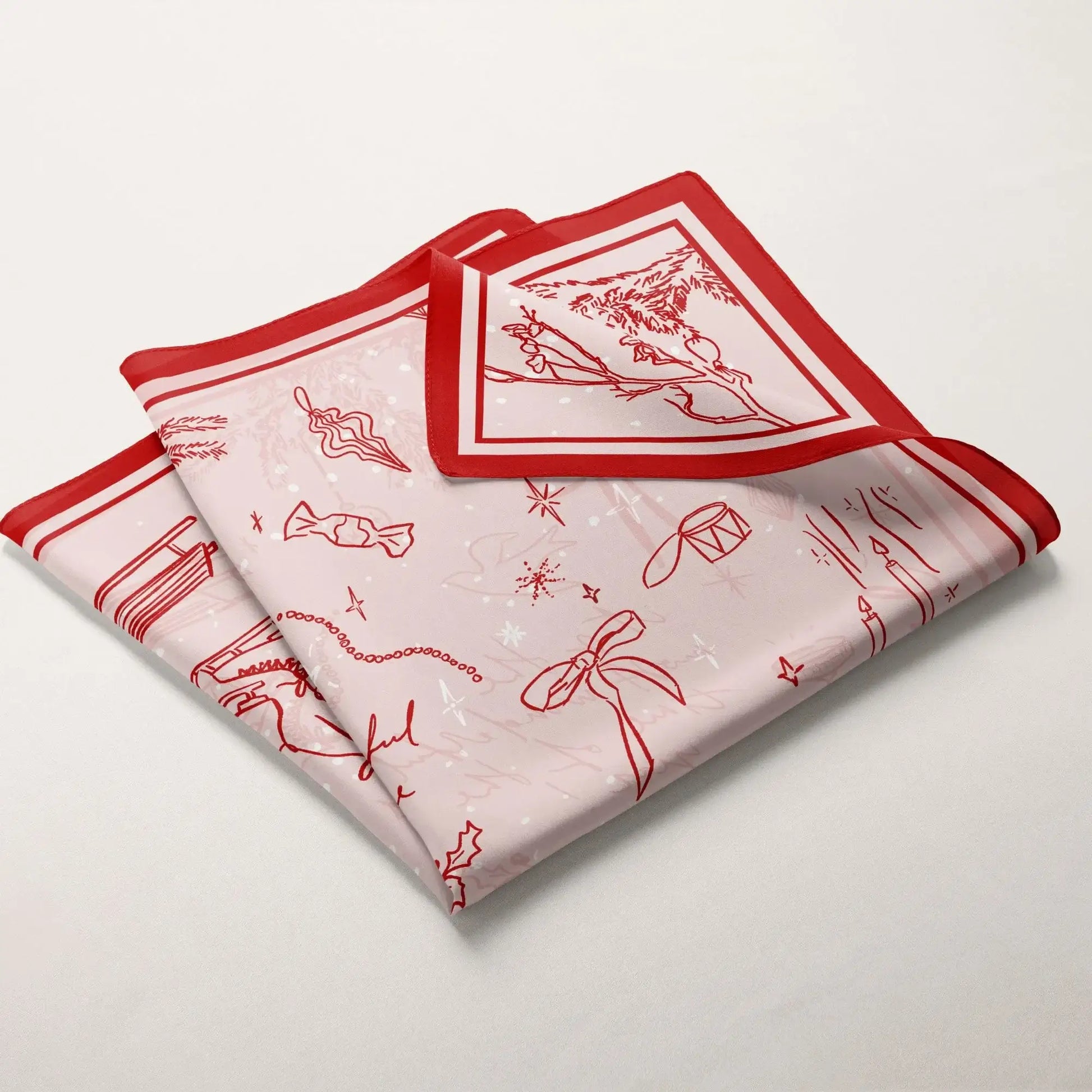 Folded Hand-Drawn Doodle Christmas Scarf with festive red sketches and “The Most Wonderful Time” message.