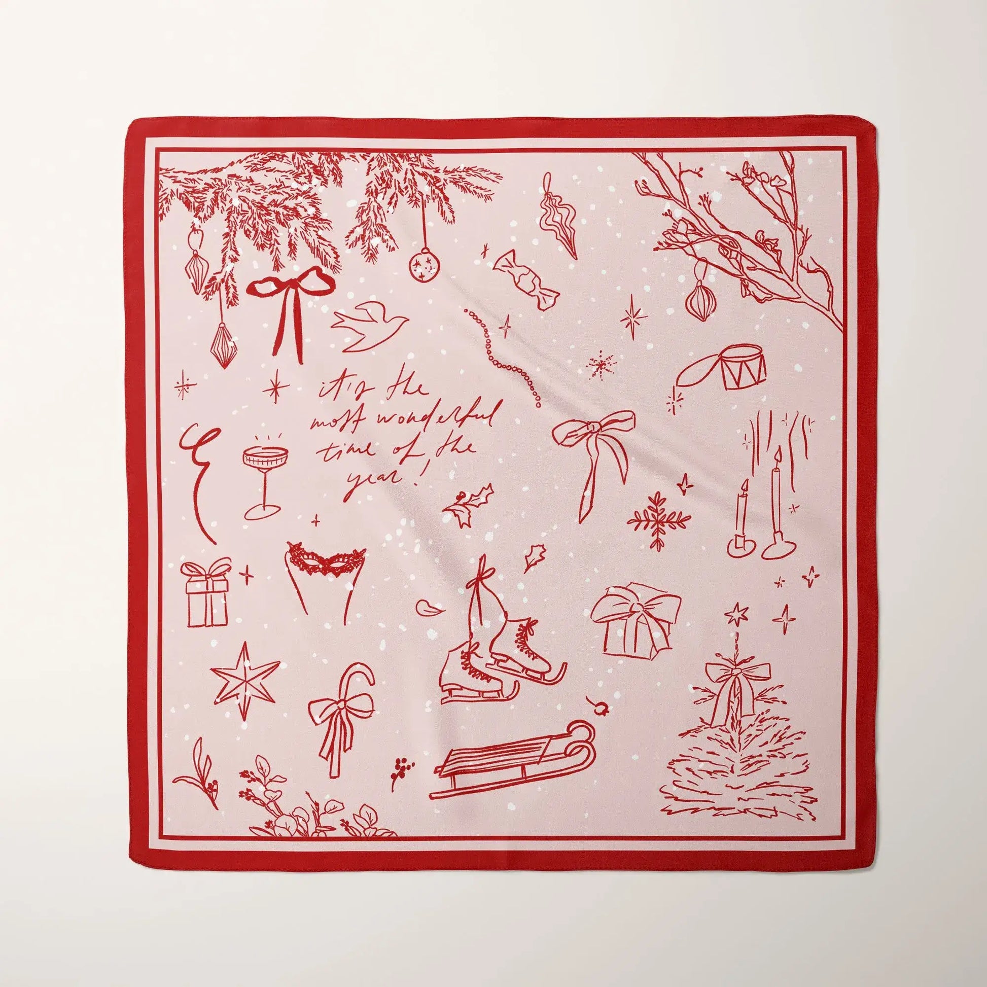 Hand-drawn Doodle Christmas Scarf in red with festive sketches and the phrase “The Most Wonderful Time of the Year