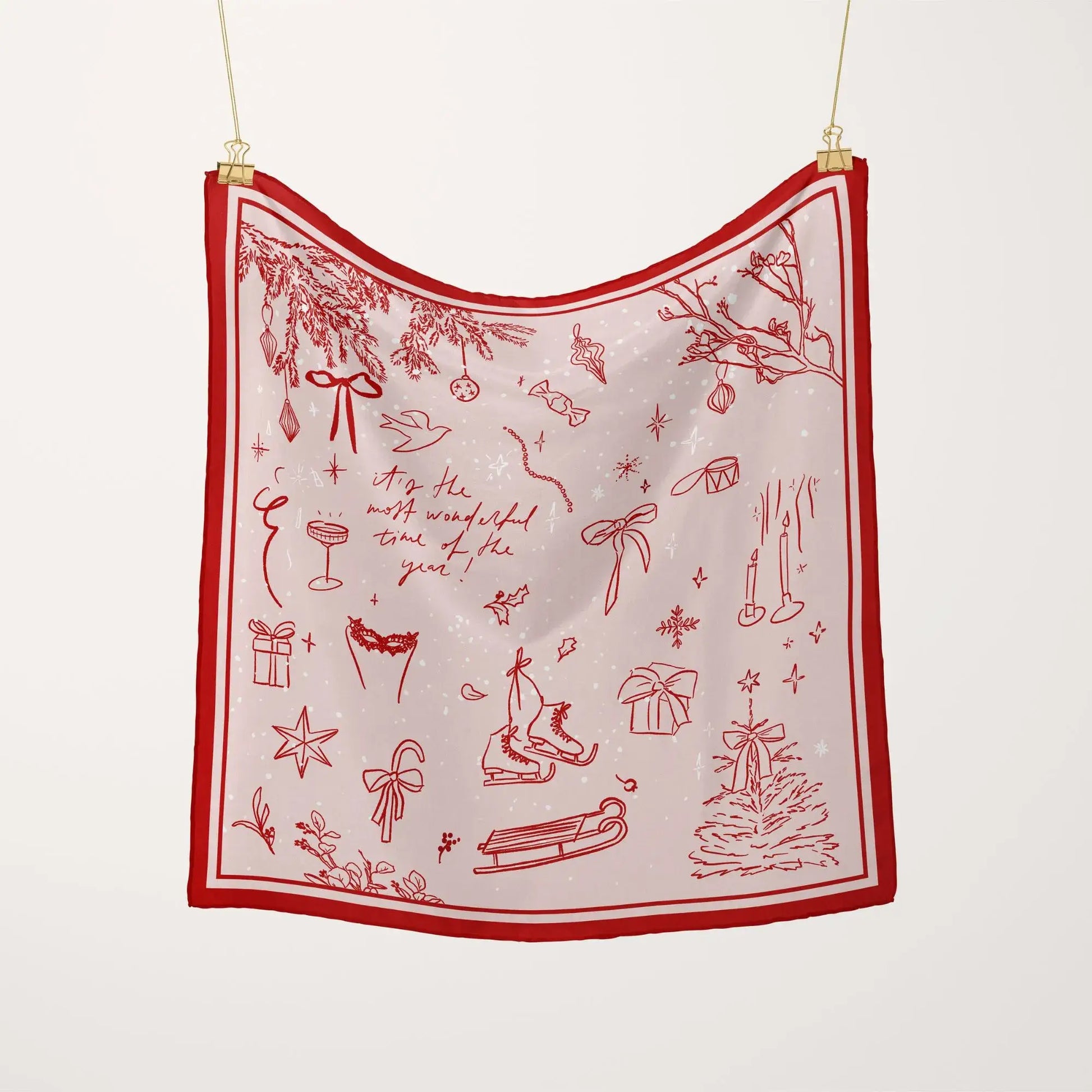 Hand-Drawn Doodle Christmas Scarf hanging flat, featuring red festive sketches and the phrase “The Most Wonderful Time.