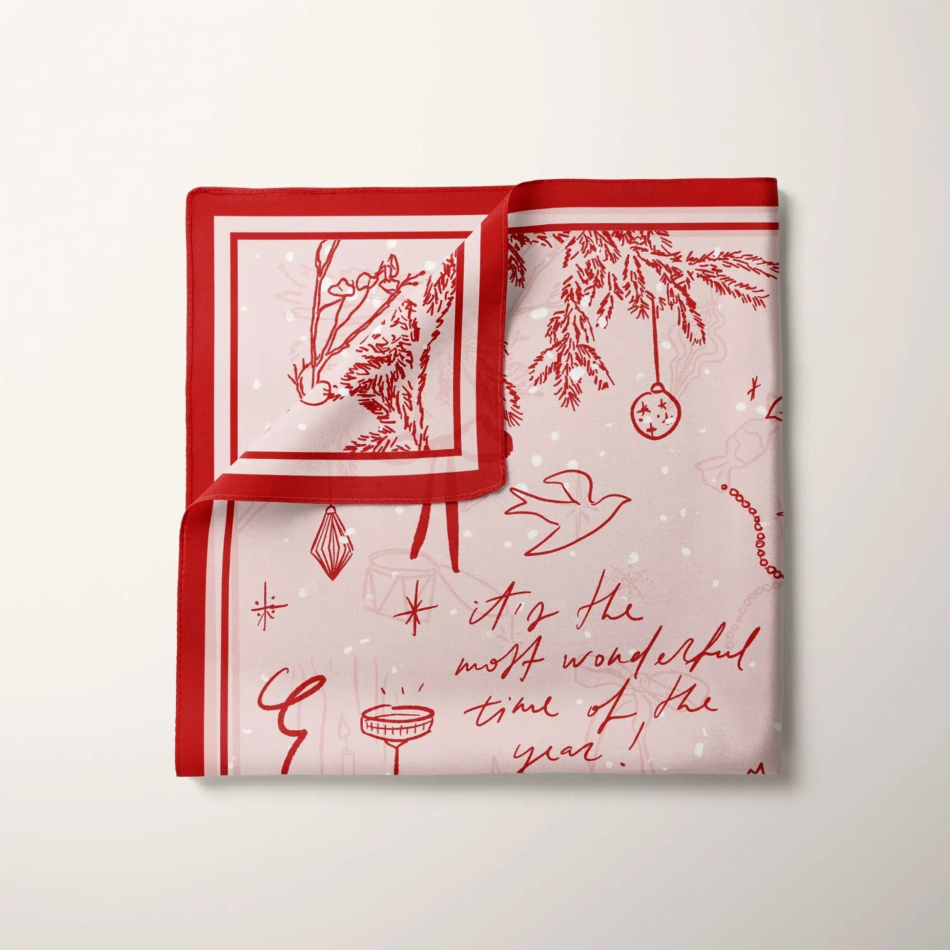 Folded red Hand-Drawn Doodle Christmas Scarf with the phrase “The Most Wonderful Time of the Year.”