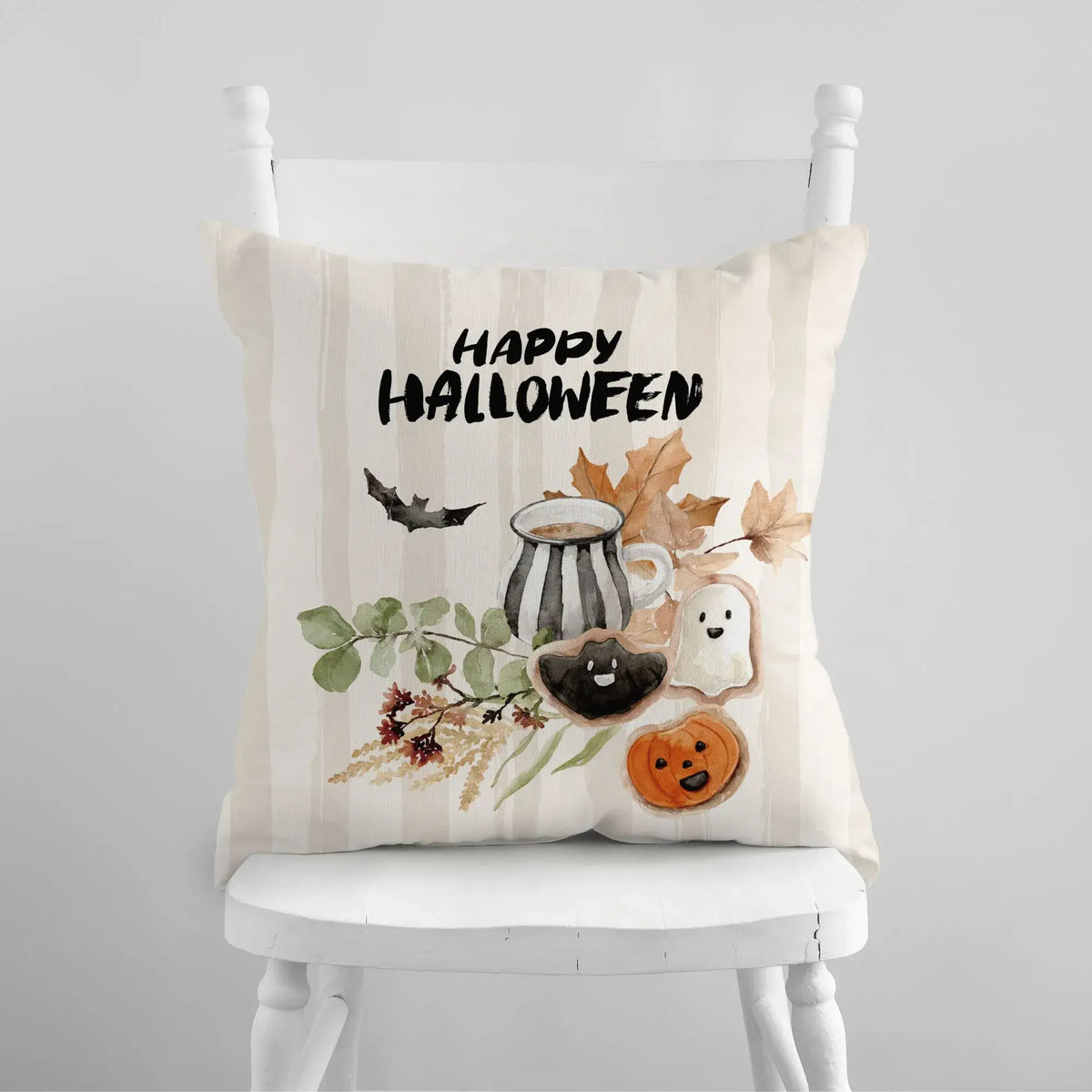 white chair with Happy Halloween Pillow Cover from Blue Water Songs on it