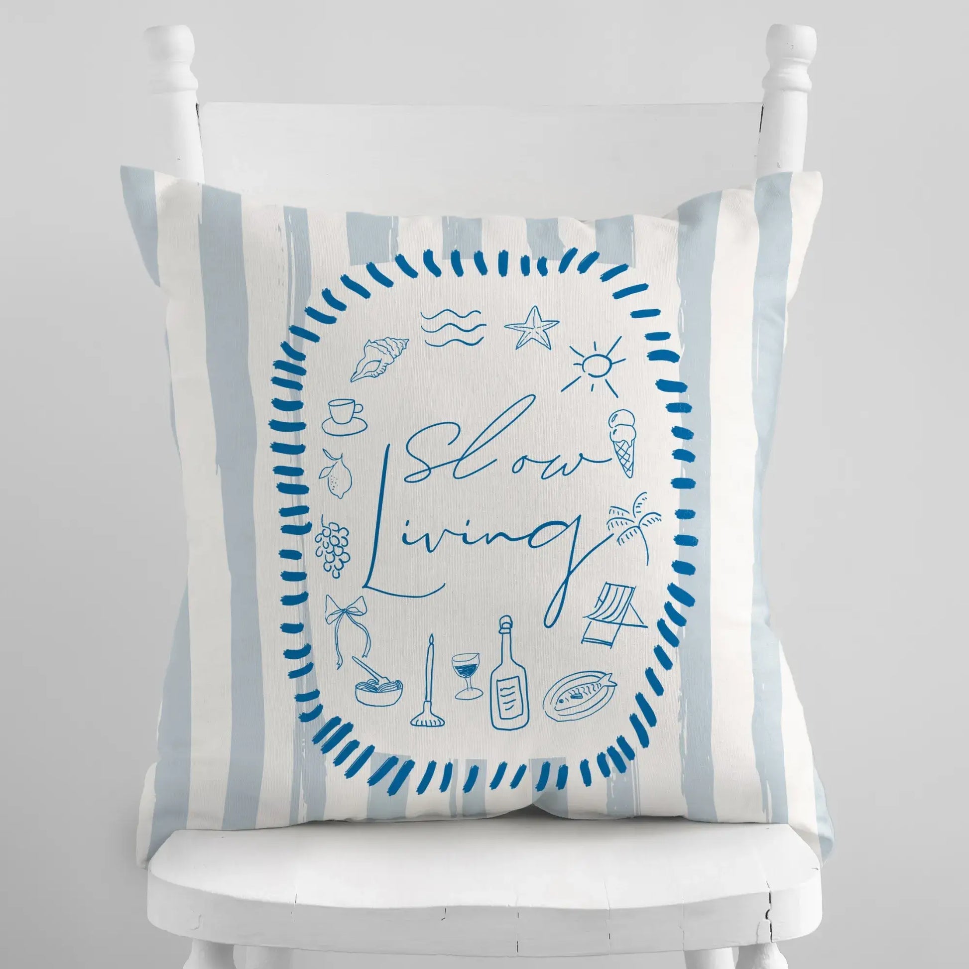 La Dolce Vita Pillow Cover featuring blue illustrations and striped design for slow living summer decor.