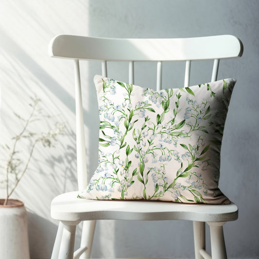 Watercolor Lily of The Valley Flowers PILLOW from Blue Water Songs on white chair next to window