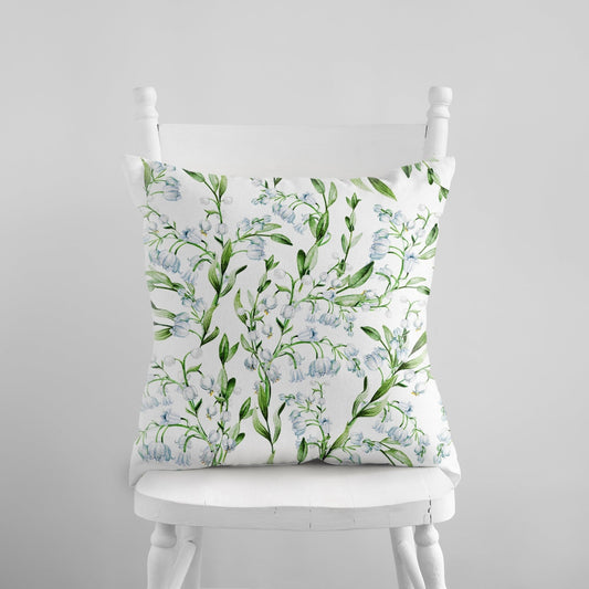 Watercolor Lily of The Valley Flowers PILLOW from Blue Water Songs on white chair