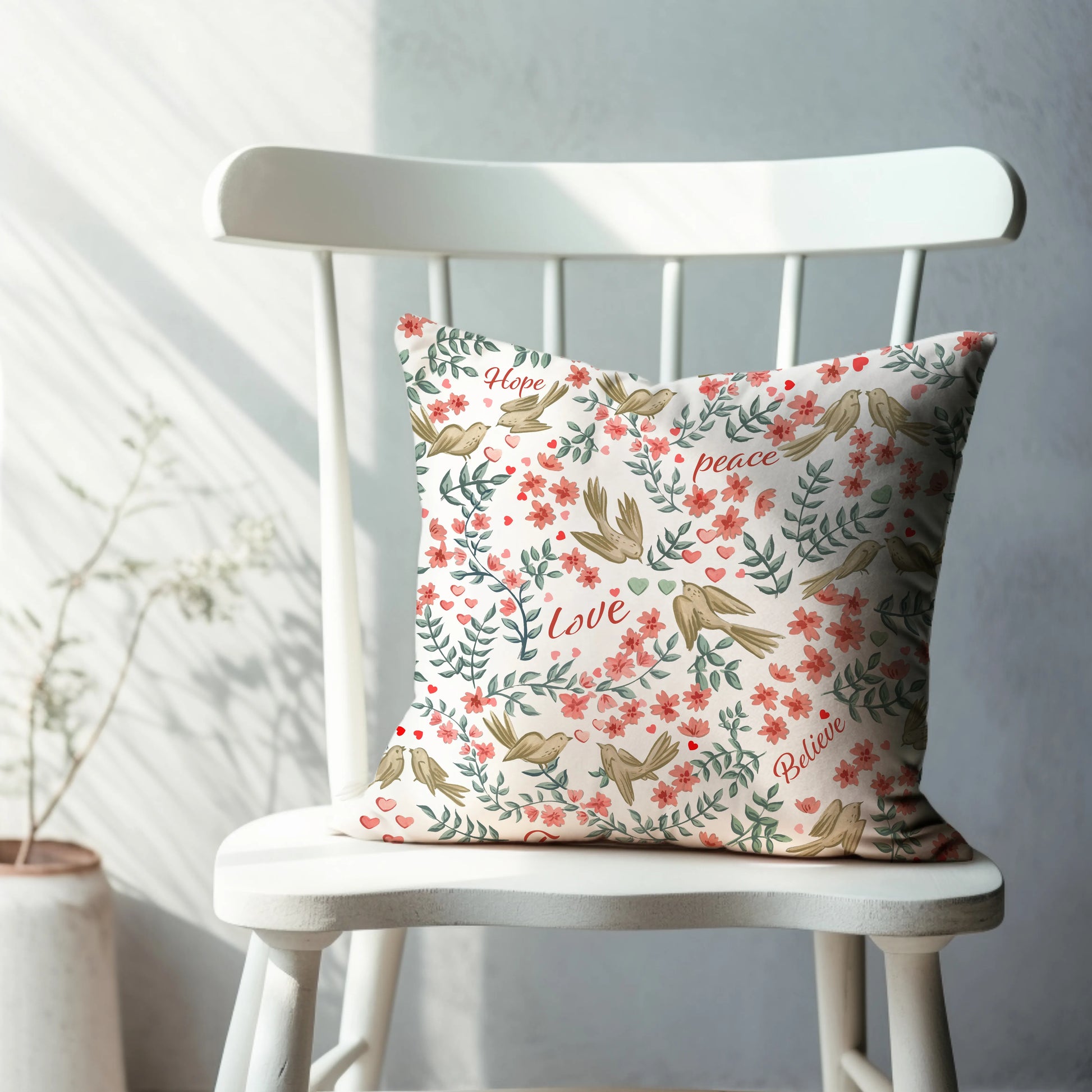 Love Birds Valentine pillow cover featuring watercolor birds, florals, and hearts on a decorative chair.