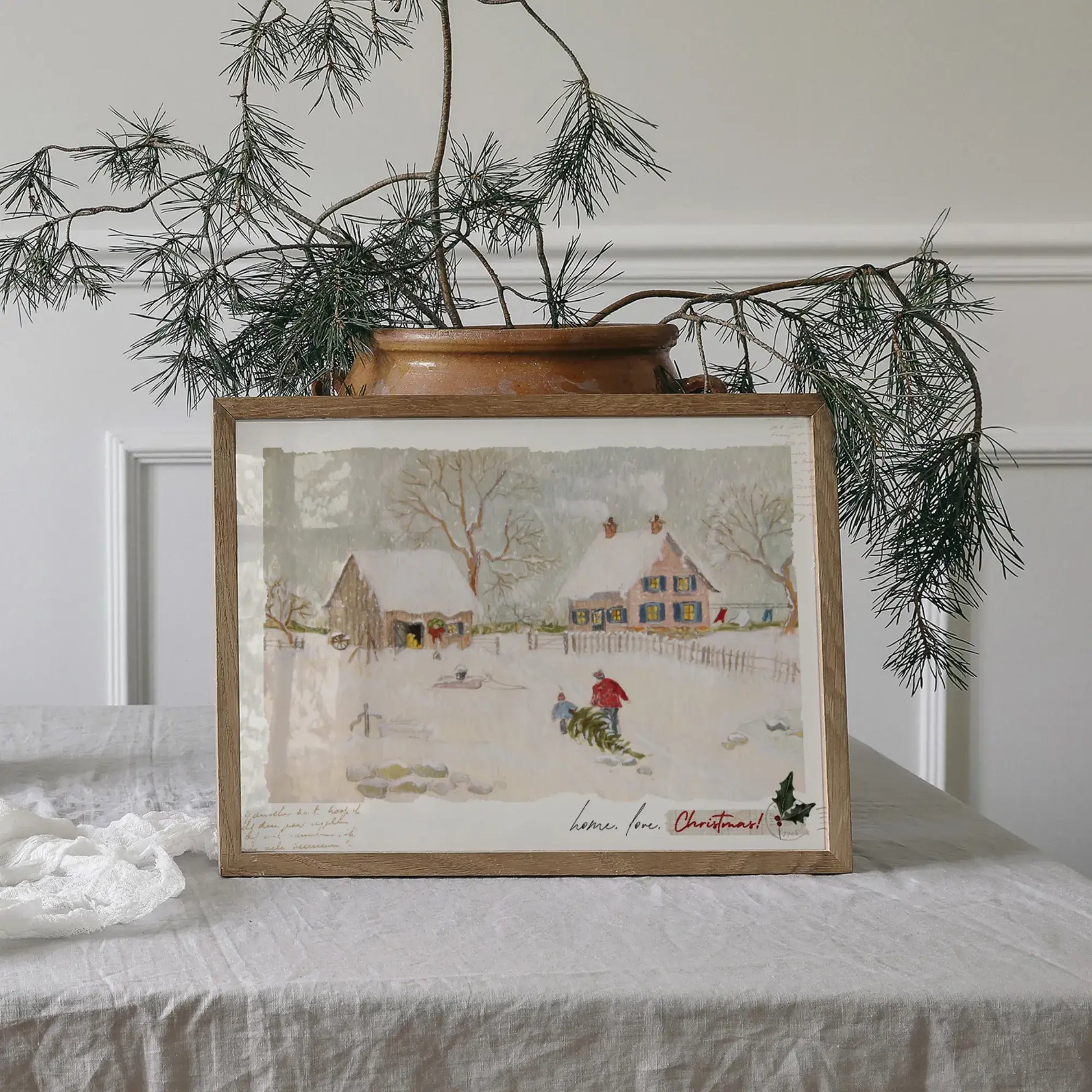 Love Home Christmas print featuring a serene winter scene with cozy holiday decor.