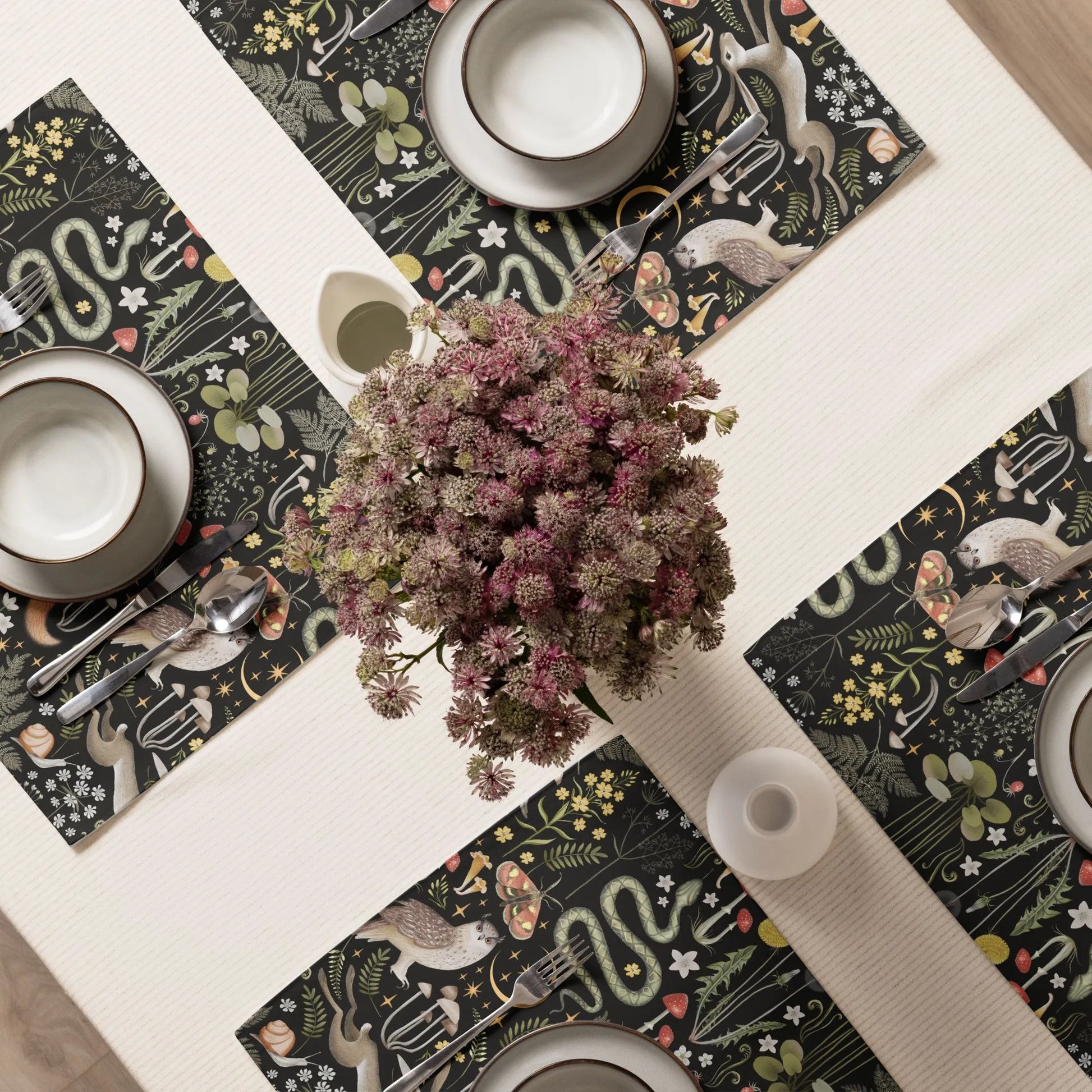 table decoration with 4 sets of black placemats from Blue Water Songs