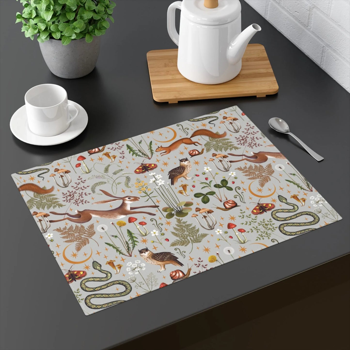 grey table with Magic Forest PLACEMAT from Blue Water Songs on it