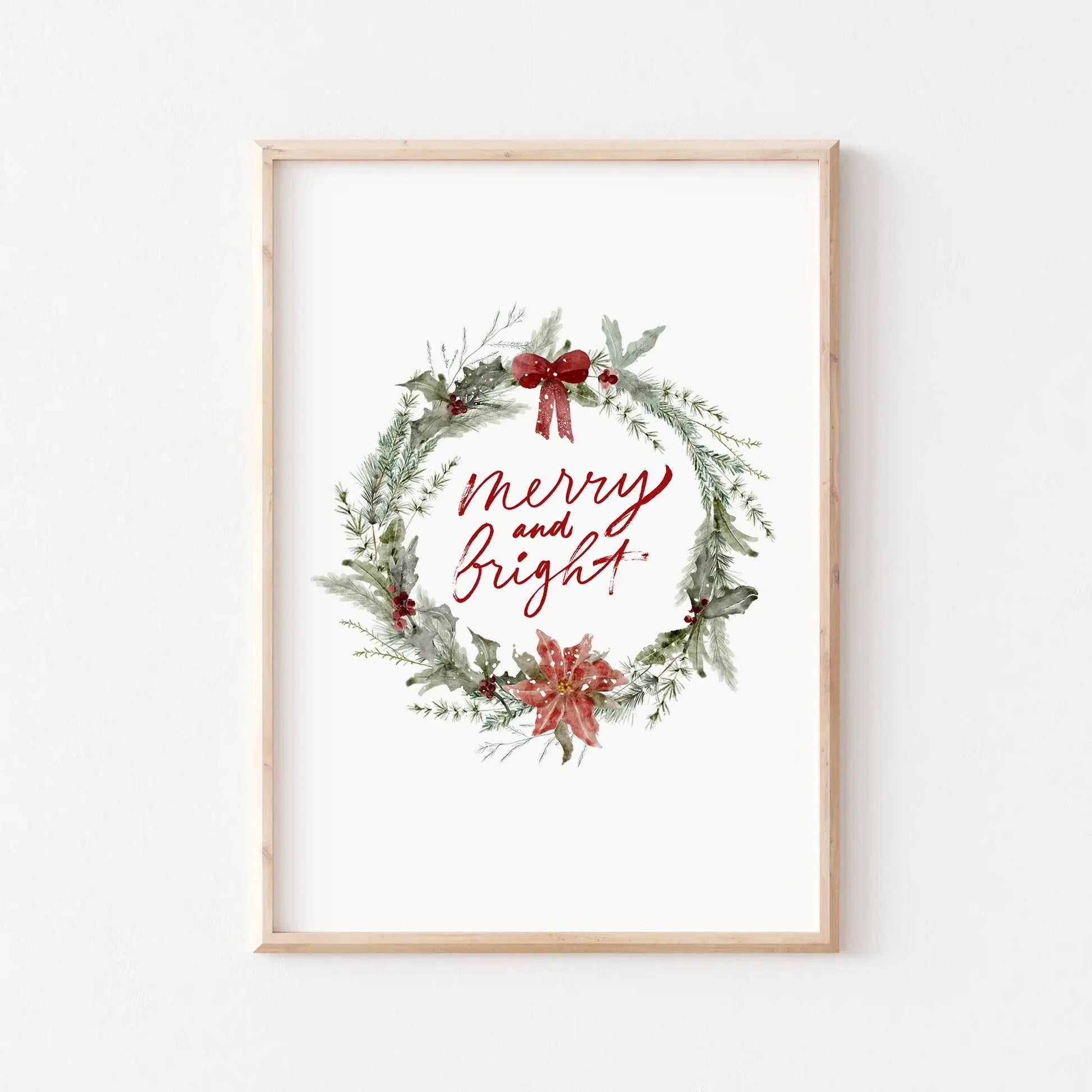 Christmas Prints Set of 4 featuring a festive wreath with "merry and bright" in red script.