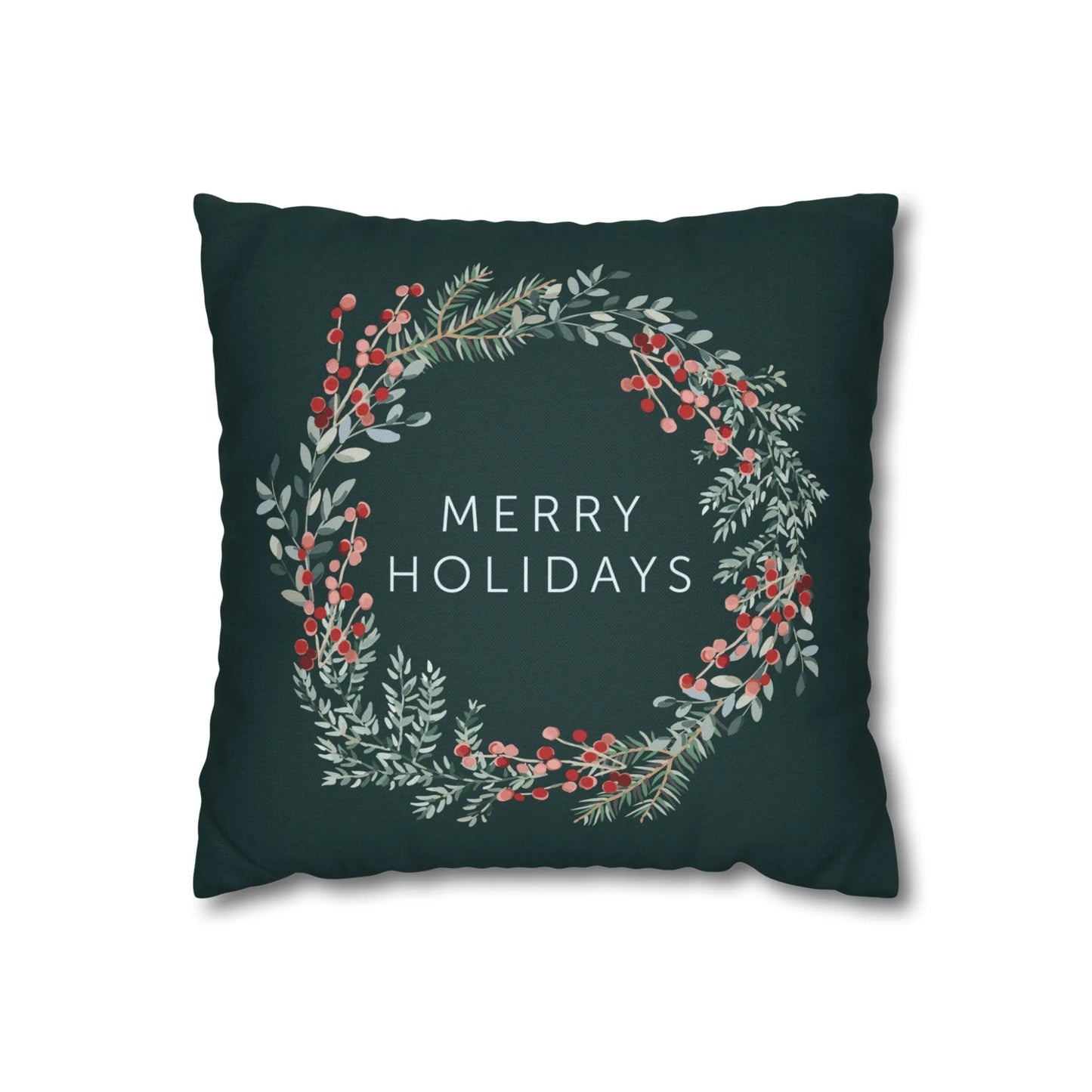 Dark green Merry Holiday pillow with festive wreath of pine branches and red berries – cozy Christmas decor accent
