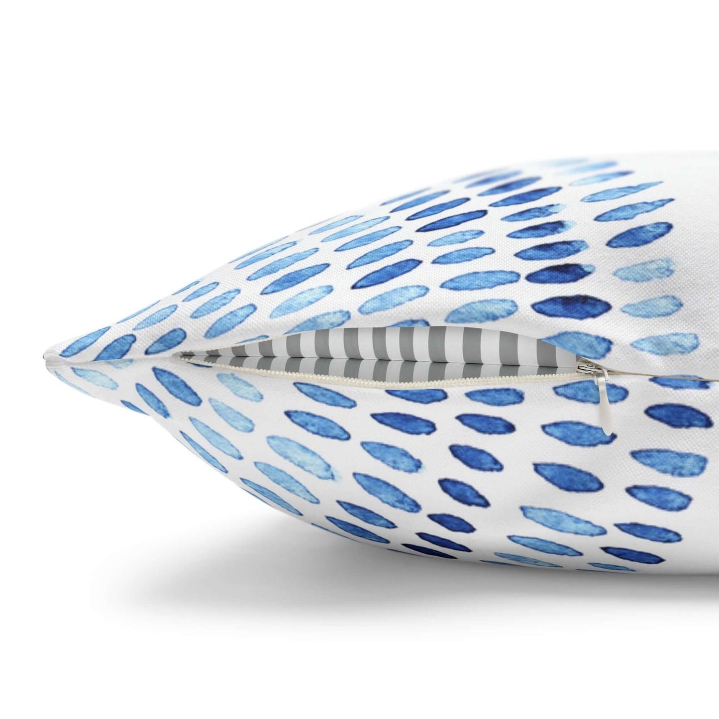 Close-up of blue watercolor pillow cover — perfect for ocean-inspired home decor