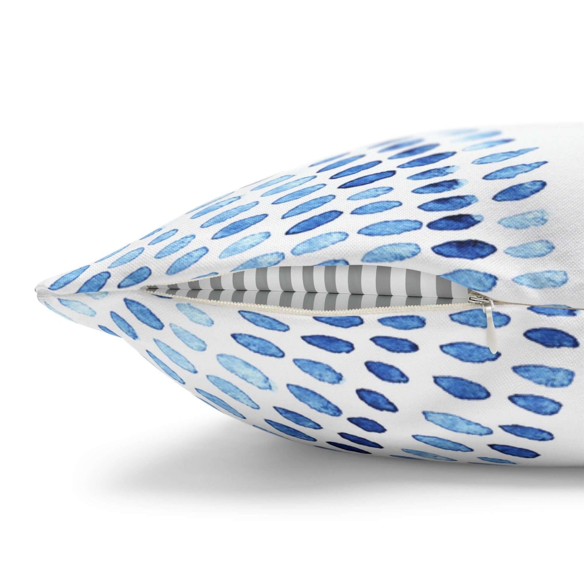 Close-up of blue watercolor pillow cover — perfect for ocean-inspired home decor
