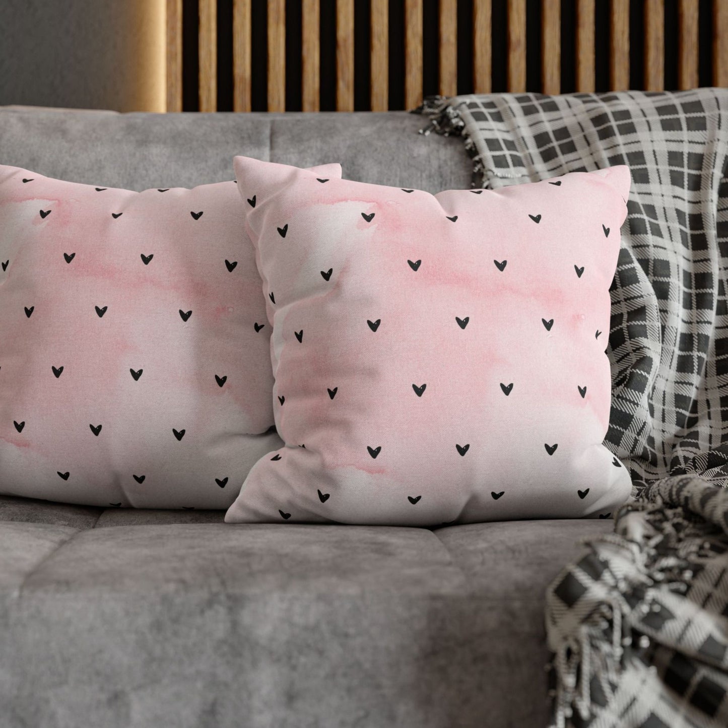 Minimalist Hearts Valentine Pillow on a gray sofa with a patterned throw, Blue Water Songs brand.