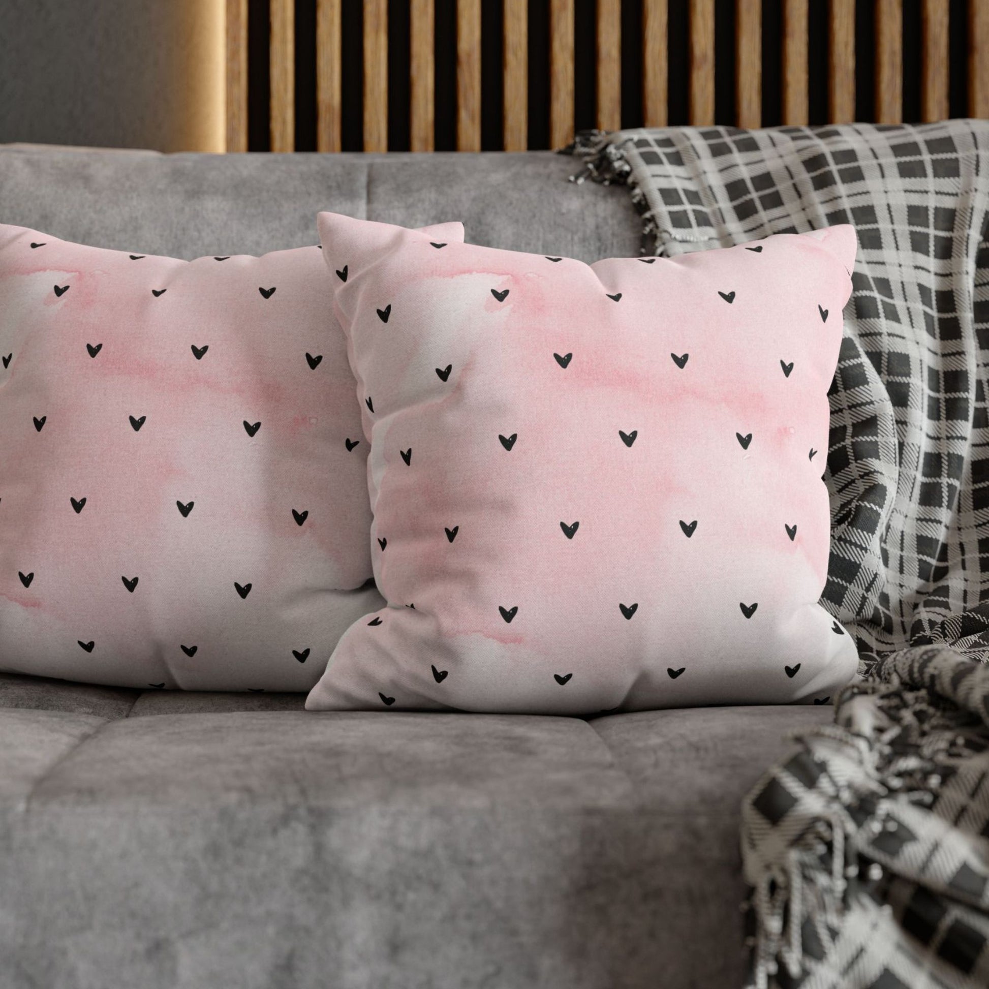 Minimalist Hearts Valentine Pillow on a gray sofa with a patterned throw, Blue Water Songs brand.