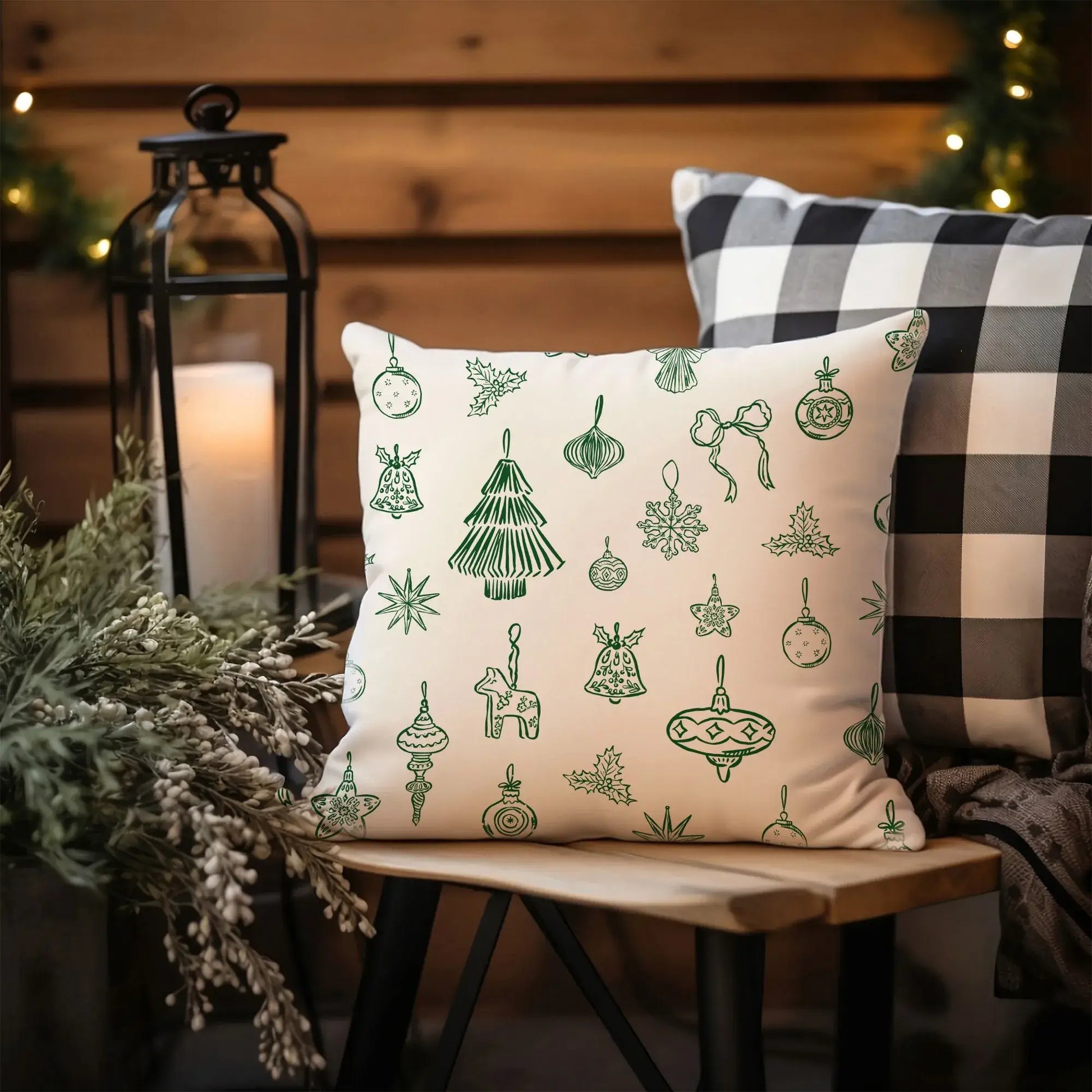 Hand-Drawn Red Ornament Christmas Pillow decorated with Nordic style ornaments in green tones on a cozy setting.