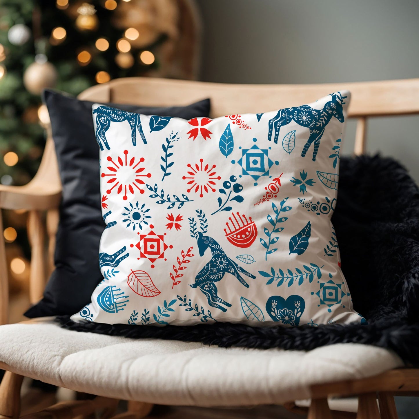 Reindeer Christmas Pillow cover featuring stylized reindeer and Nordic floral patterns in blue and red.