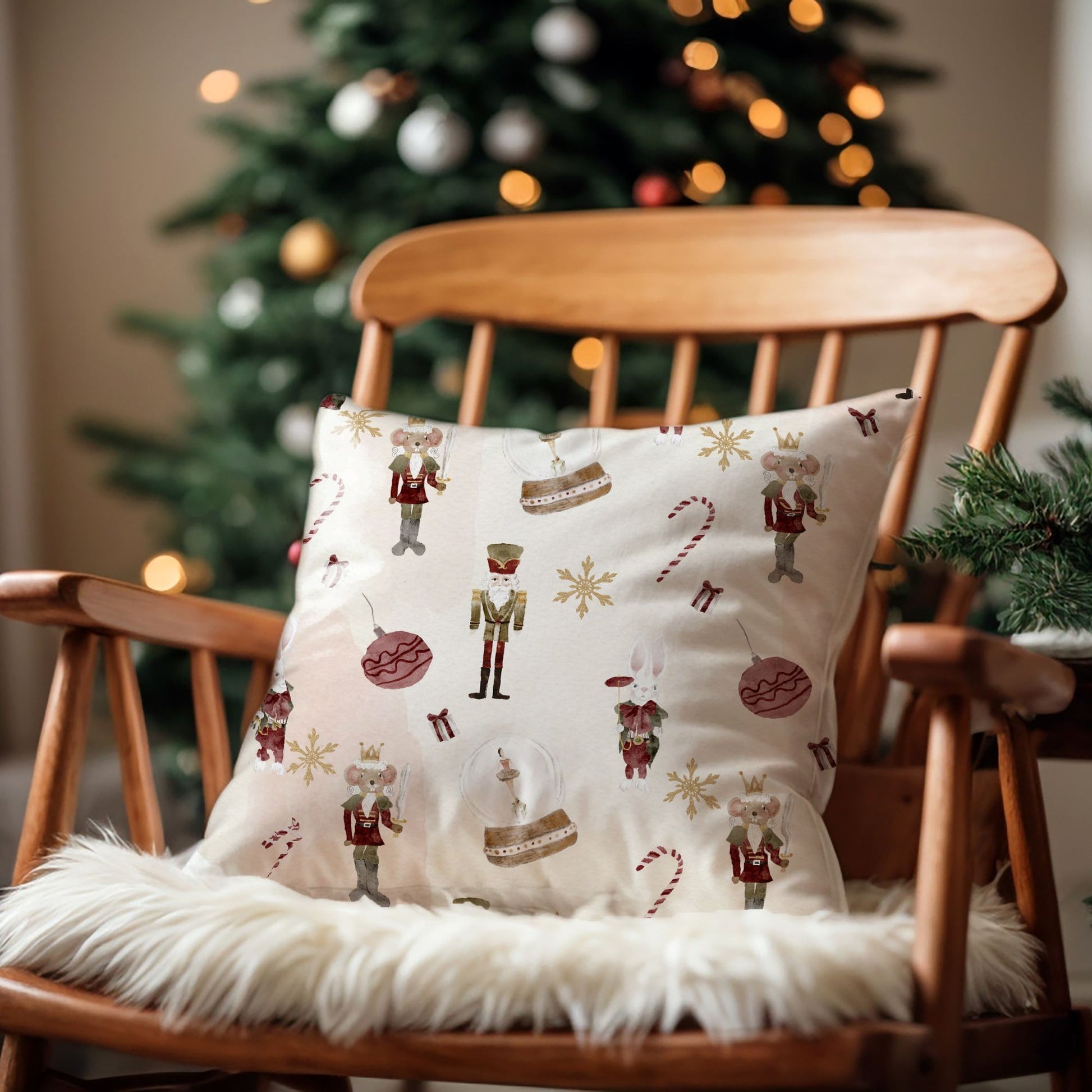 Watercolor Nutcracker PILLOW from Blue Water Songs on wood chair with christmas tree behind